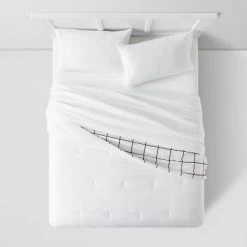 Reversible Microfiber Grid Comforter - Room Essentials™ Navy -Room Essentials Sales Store GUEST 242e81a6 f0ef 4ed6 ab64 0ea7d1fd9855